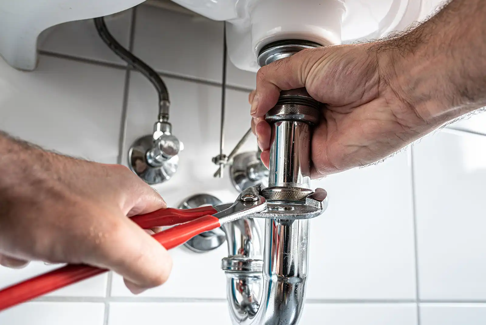 wrenching sink pipe